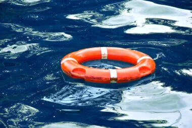 red-lifebuoy-blue-water